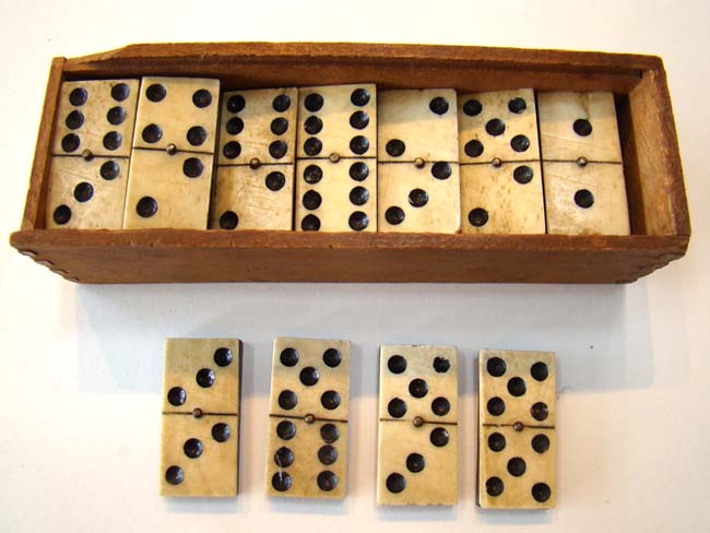 A complete set of 28 Civil War era bone& ebony dominoes circa 1865